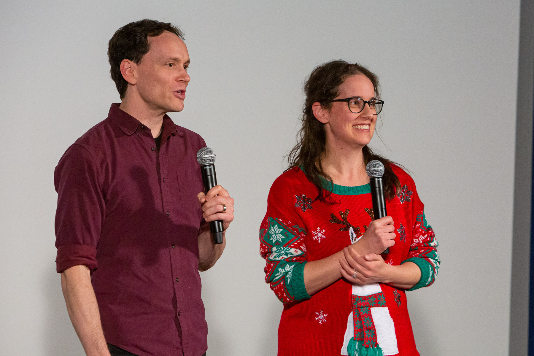 Devin Bell, left, and Meghann Artes, associate professors in the School of Cinematic Arts, answer questions from guests after presenting the release of “Merry Christmas from DePaul" for the first time. (DePaul University/Randall Spriggs)